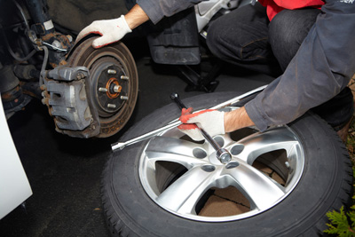 Mechanic changing tire